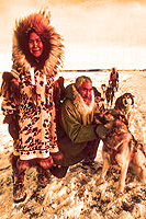 Eskimo Couple With Dog Sled Team(c) Alaska Division of Tourism